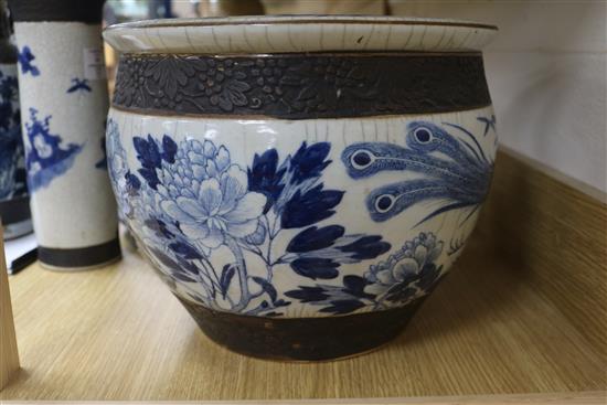 A Chinese blue and white crackleglaze jardiniere and two vases